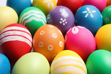 Fototapeta na wymiar Colorful Easter eggs with different patterns as background, closeup