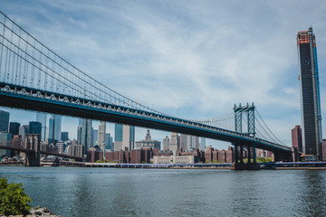 Manhattan Bridge and view on New York downtown