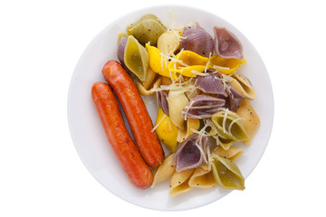 tasty appetizing pasta with German sausages on white plate