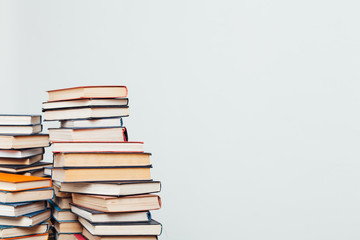 a lot of stacks of educational books in the library on a white background