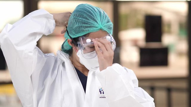doctor wearing  PPE suit personal protective equipment for working prevent corona virus covid 19.