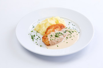 cutlet with mashed potato on the white background