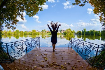 girl on the background of the lake