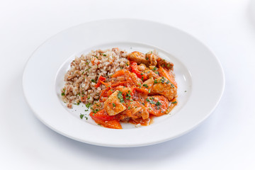 chicken with buckwheat on the white background