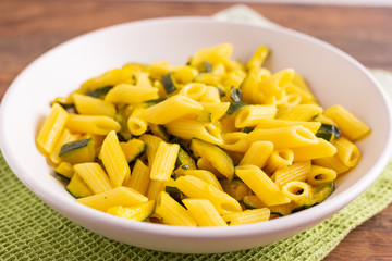 Penne pasta with zucchini and saffron.