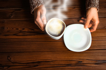 a female hands and coffee