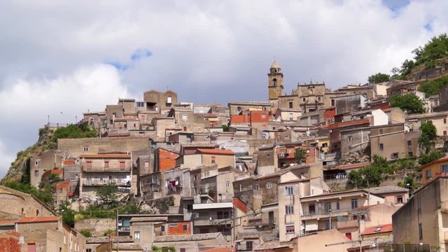 Agira, a typical Sicilian hinterland town, with its churches, the castle and the spectacular view of Mount Etna and Lake Pozzillo.