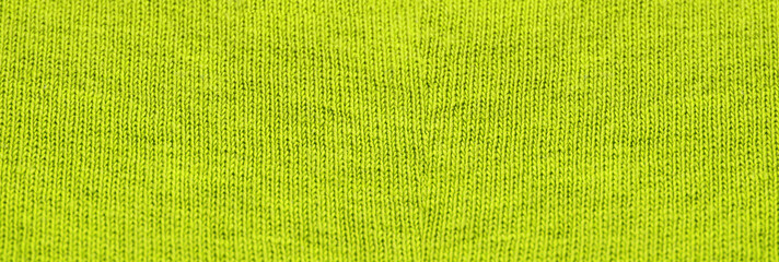 Bright yellow woven thread texture pattern. Light colorful yellow fabric background. Yellow color clothes design, horizontal blank wallpaper