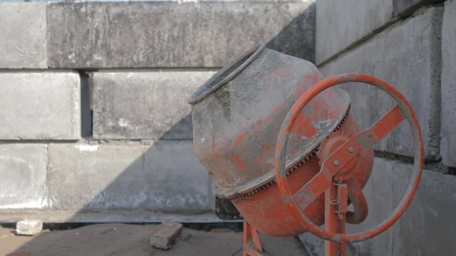 Industrial cement lifestyle mixer machine a construction site. concept building constructing architect concrete pouring. Mixes the sand, gravel and water