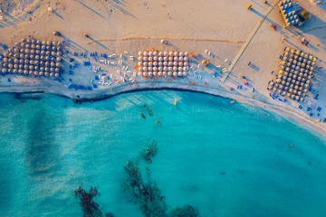 Fotobehang Elafonissi Strand, Kreta, Griekenland Aerial view of beautiful tropical Elafonissi Beach with pink sand. View of a nice tropical Elafonissi beach from the air. Beautiful sky, sea, resort. Elafonissi beach, Crete, Greece.