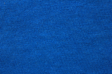 Blue fabric texture background, abstract close-up dark blue color cloth. Empty clothes pattern...