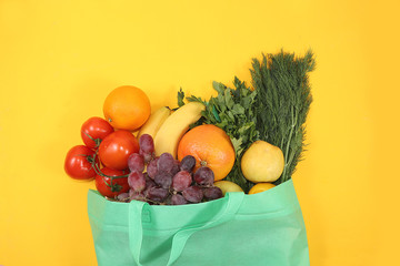 Healthy natural food in an eco bag, the concept of a healthy lifestyle, zero waste. Food delivery, donation, coronavirus quarantine. Vegetables, fruits in tissue packaging, diet. Banner