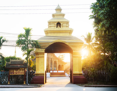 Entrance to wat manorom temple at sunset, Luang Prabang, Laos, Southeast Asia