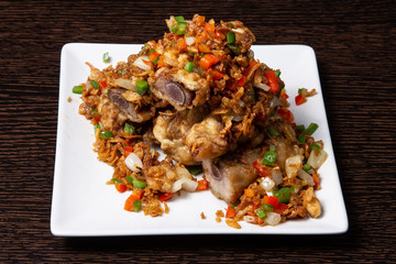 Fried ribs with onion