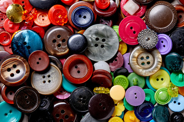 Background and texture of multicolored antique buttons