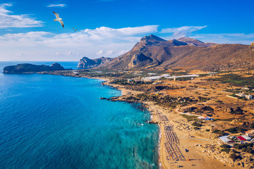 Aerial shot of beautiful turquoise beach Falasarna (Falassarna) in Crete, Greece. View of famous...
