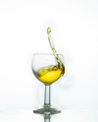 splash of liquor drink with white background