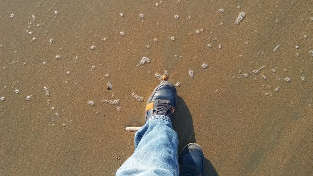 plaza piach morze kamyk stopa