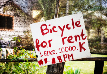 Bicycle for rent sign on the island of Don Det, four thousand islands, Si Phan Don, Laos, Southeast Asia
