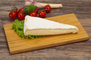 Brie cheese triangle served salad