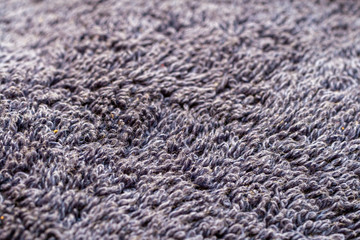 Microfiber texture of purple towel close-up