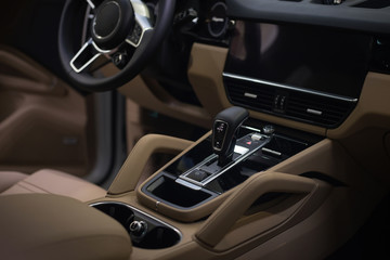 Obraz na płótnie Canvas Luxury car interior. Control panel and automatic transmission.