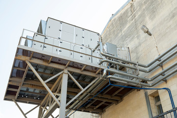 ventilation and cooling systems installed on the street outside the building