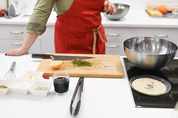 cook at work in the kitchen. cook in the kitchen.