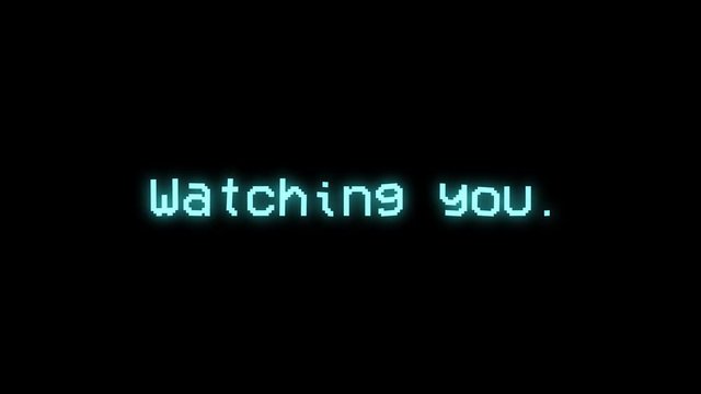 A scary text Watching you, animated on black background. 4k video.