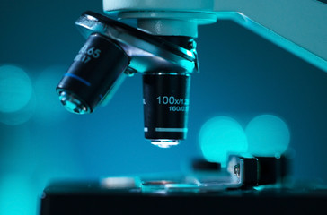 Close-up of scientific microscope. Laboratory in hospital. Epidemic disease, healthcare, vaccine research and coronavirus covid-19 test.