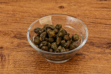 Tasty capers in the bowl