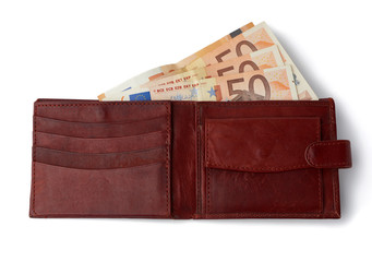 open brown leather wallet with euro paper money isolated on white background