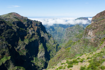 Fototapeta premium View from scenic hiking path along Pico do Areiiro on Madeira island in Portugal.