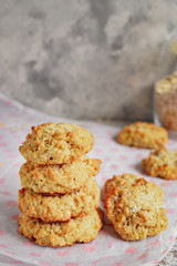 Oatmeal cookies on a light background. A stack of oatmeal cookies. Homemade healthy pastries.