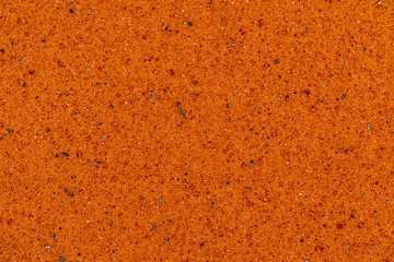 Background and texture of golden color memory foam for mattresses.