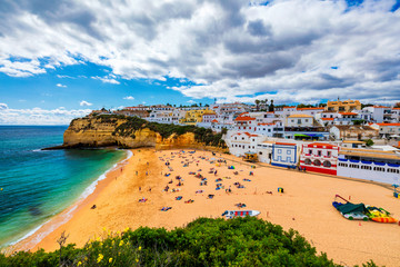 View of Carvoeiro fishing village with beautiful beach, Algarve, Portugal. View of beach in...