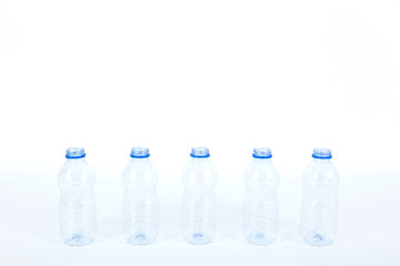 row of plastic bottles for recycling