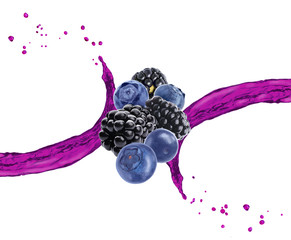 Delicious ripe berries and splashes of juice on white background