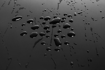 Detail of water drops, Dark color tone, abstract background