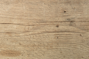 Fototapeta premium Old wood background in grey brown colors with knots