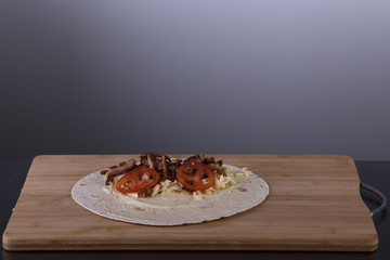 Chef cooking shawarma in restaurant kitchen1