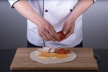 Chef cooking shawarma in restaurant kitchen10