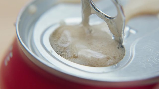 Fizzy Cola Drink Can of Refreshing Soda Pop Opening in Super Slow Motion