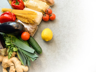 Crisis food products for isolation period. Macaroni, oil, canned food, vegetables, sugar, oatmeal, millet, lemons, ginger. Food Delivery, Donation, Coronavirus Quarantine.