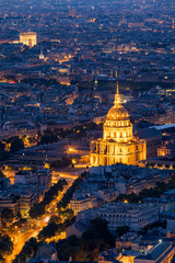 Fototapeta na wymiar Paris aerial with Les Invalides, France. Twilight aerial view of Paris, France from Montparnasse Tower with Les Invalides building and Arc de Triomphe. Beautiful Les Invalides in Paris, France