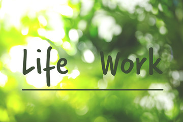 Blurred view of green leaves on sunny day. Concept of balance between work and life