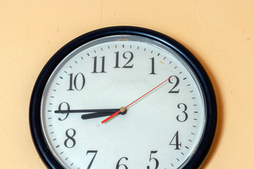 Cheap plastic clock on a wall