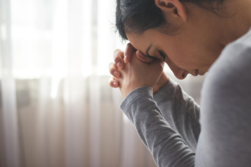 Portrait of woman praying