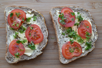 Sandwiches with butter and tomato