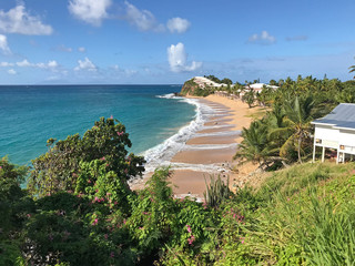 St. Mary, Antigua, Antigua and Barbuda - December 21, 2019: Scenic beach front view of Curtain...